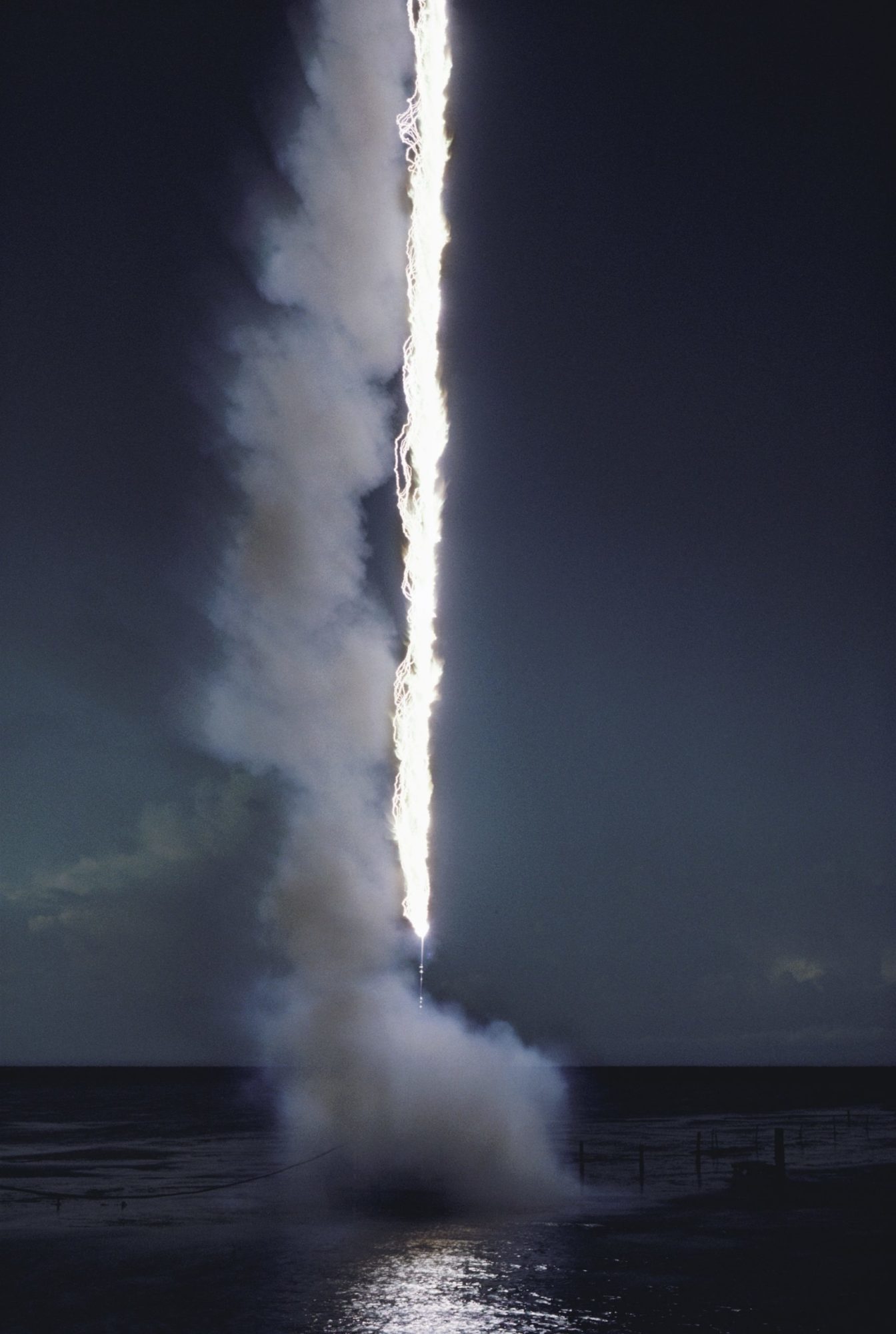 Rocket-triggered lightning strike at Mosquito Lagoon Rocket-triggered lightning strike at Mosquito Lagoon by Peter Menzel